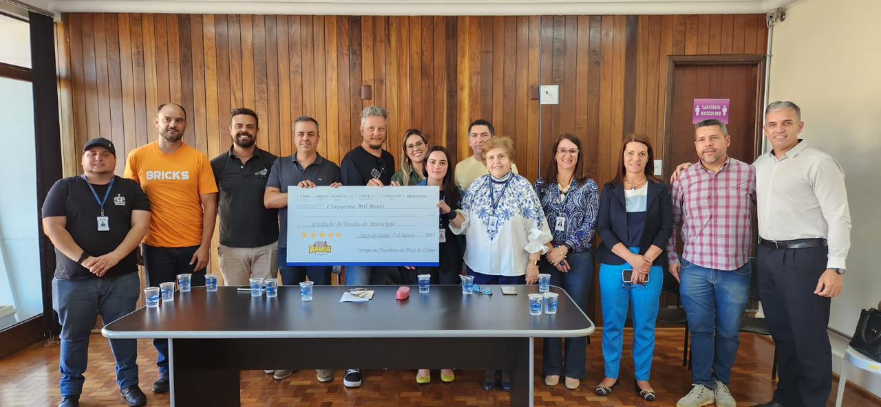 Unidades educacionais participantes do Arraiá de Poços 2023 recebem R$ 50 mil das cervejarias artesanais